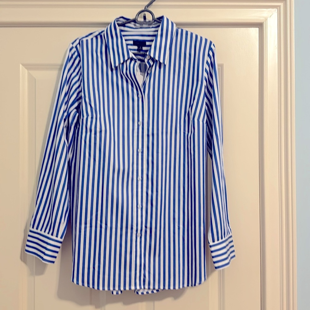 New!!!  Blue and white stripped shirt w 4 buttons on each side.